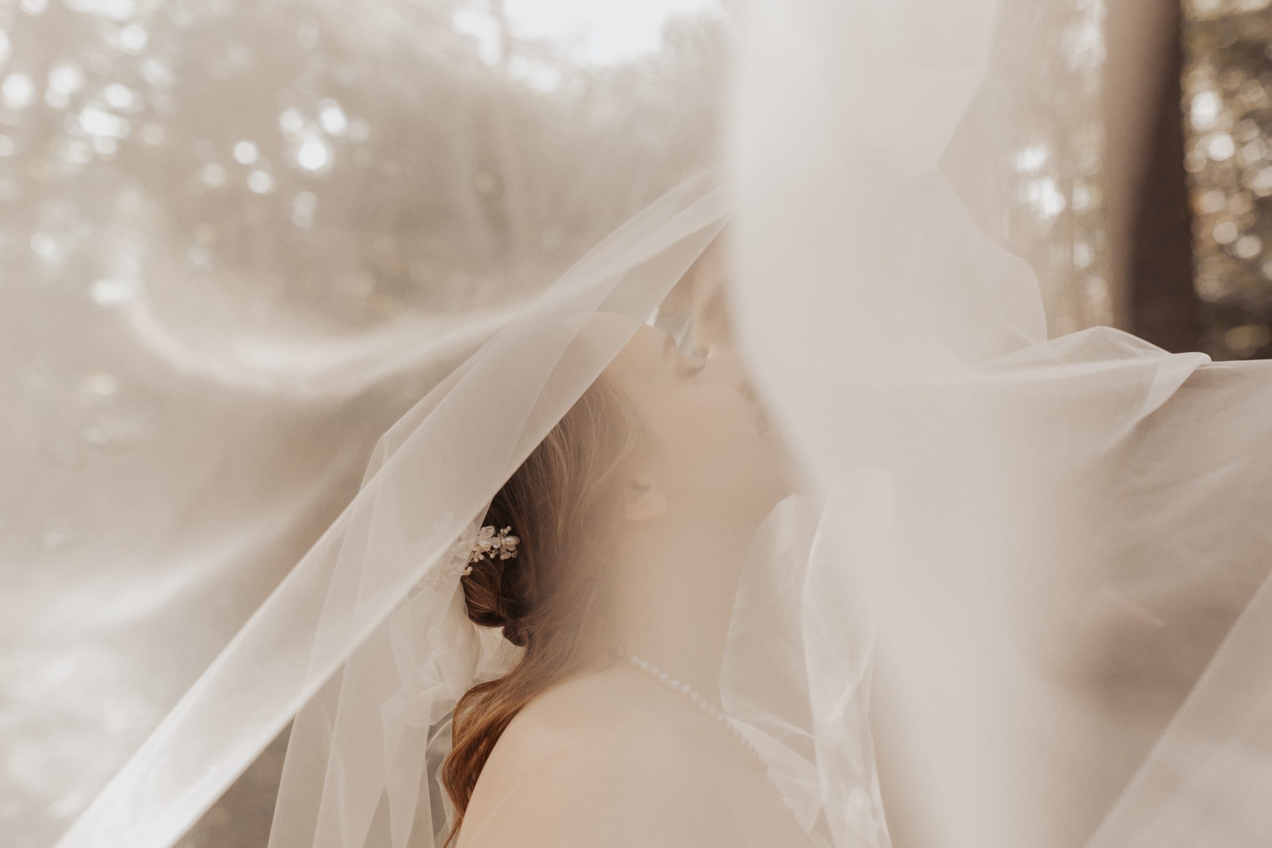 montreal micro wedding with bride and groom kissing under the veil