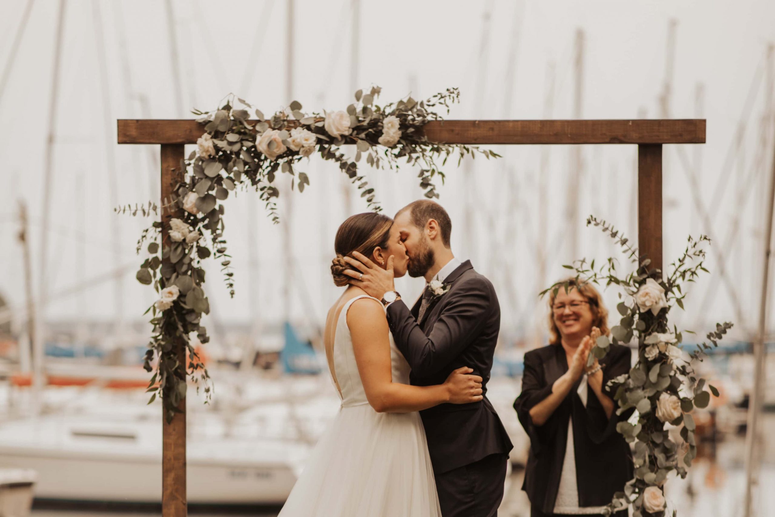 bride and groom kissing after their wedding vows